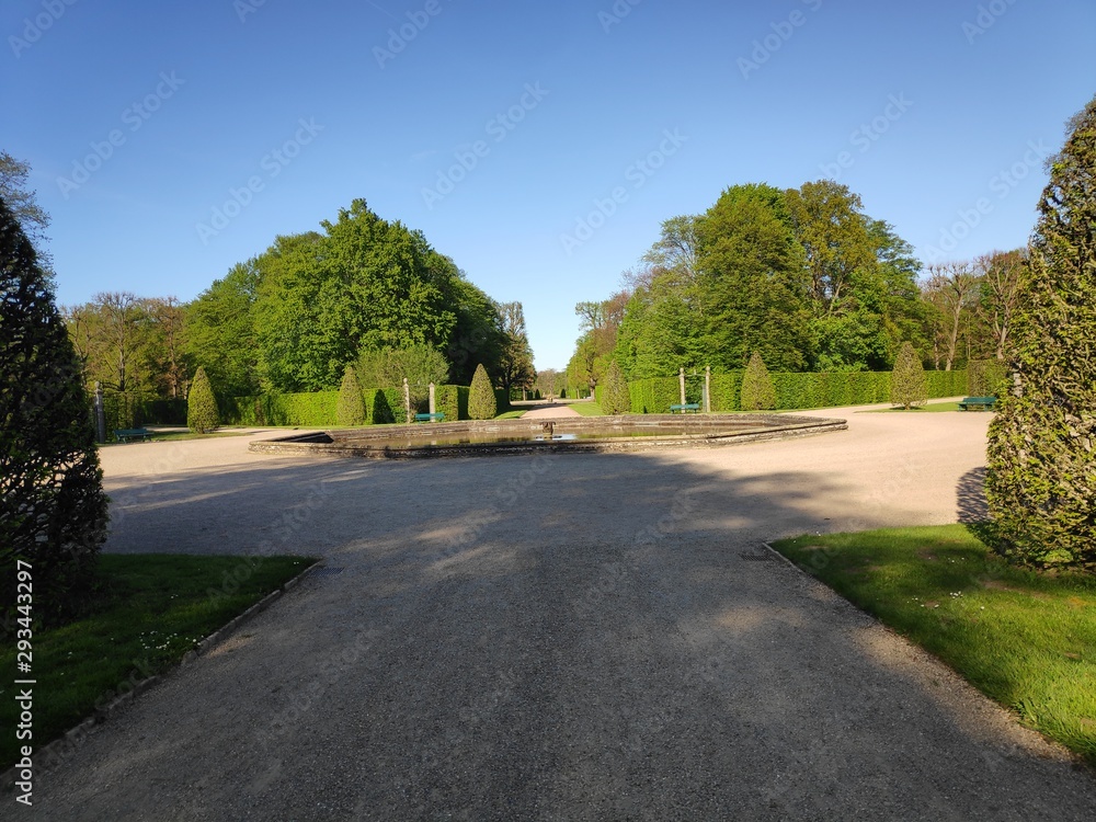 Road junction with big fountain in Herrenhausen Gardens Hanover Road junction with big fountain in Herrenhausen Gardens Hanover