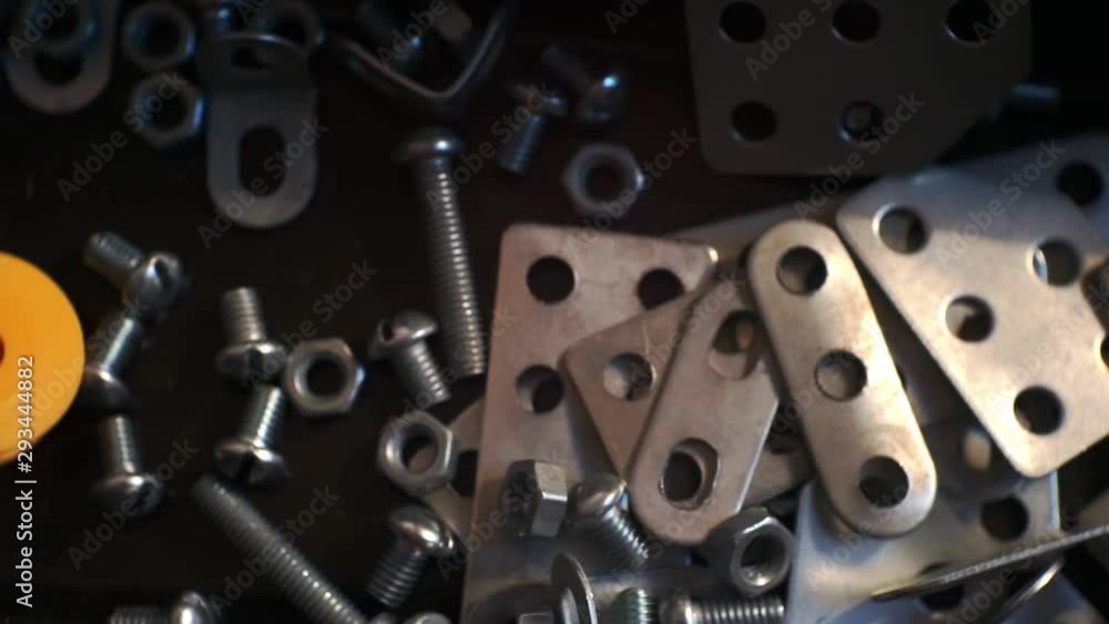 set of various metal mechanical elements of different shapes in a box.close-up.top view.