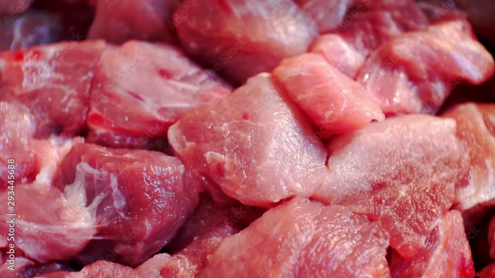 fresh raw meat sliced into pieces.close-up fresh raw meat sliced into pieces.close-up