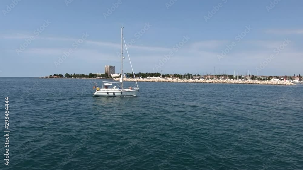 Slow motion yacht sailing in Umag bay, Croatia Slow motion yacht sailing in Umag bay, Croatia