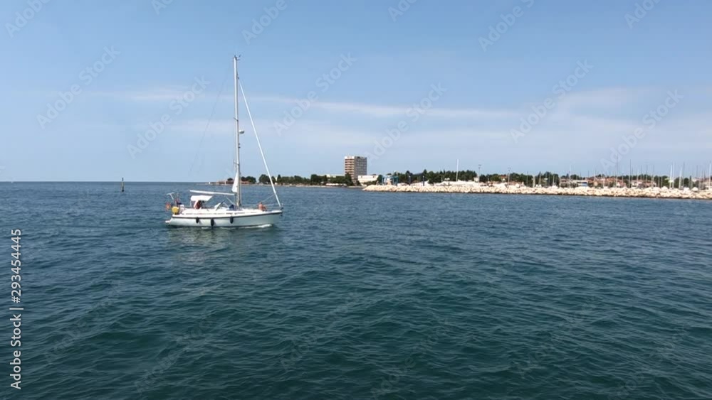 Slow motion yacht sailing in Umag bay, Croatia Slow motion yacht sailing in Umag bay, Croatia