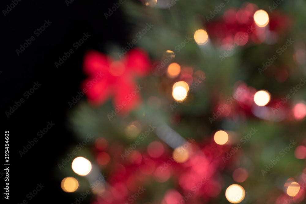 bokeh of the Christmas tree with black background bokeh of the Christmas tree with black background