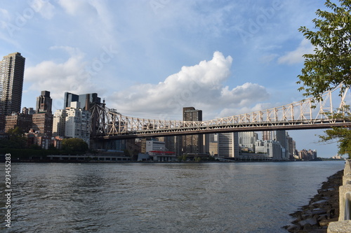 The Ed Koch Queensboro Bridge  also known as the 59th Street Bridge  and the midtown Manhattan skyline viewed from New York City s Roosevelt Island. -08