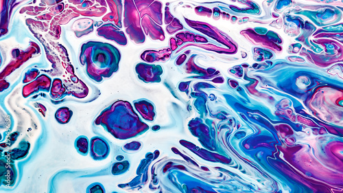 Fluid Art. Abstract colorful background, wallpaper. Mixing paints. Modern art.
