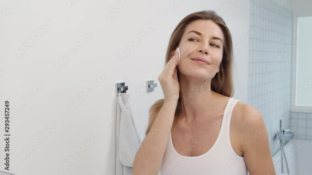 Woman Cleaning Face Woman Cleaning Face