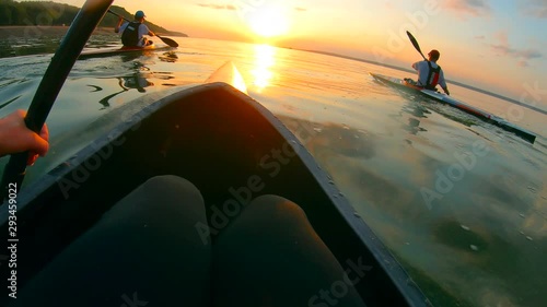 First-person view of a paddler taking part in a race on the lake photo