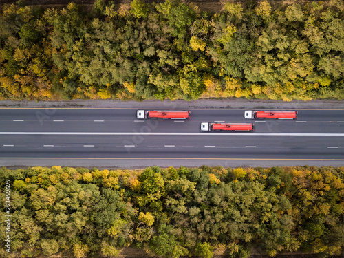 Gasoline trucks on highway. Aerial shot from above.