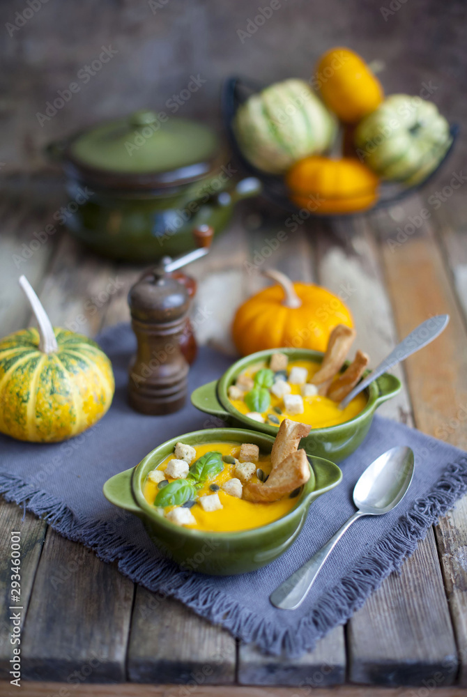 Creamy pumpkin soup topped with pumpkin Creamy pumpkin soup topped with pumpkin