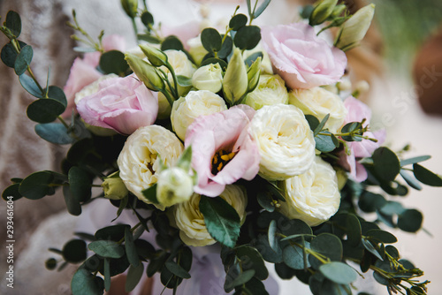 Wedding Bridal Bouquet. Bridal bouquet of white and pink colors. Bride with bouquet  closeup