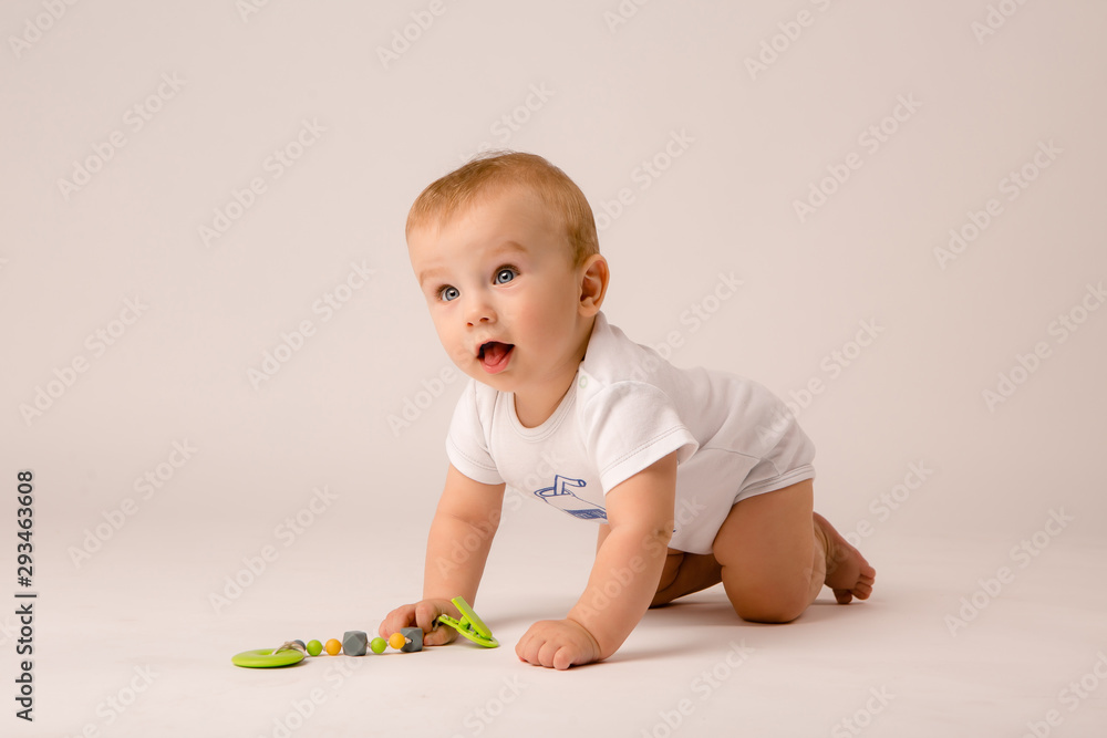 cute toddler boy on white background looking in frame, space for text, baby 8 months on white background cute toddler boy on white background looking in frame, space for text, baby 8 months on white background