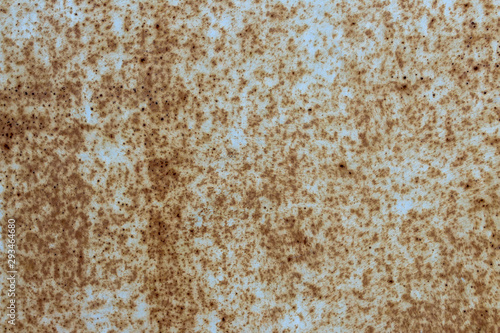 Rusty metal with holes background texture