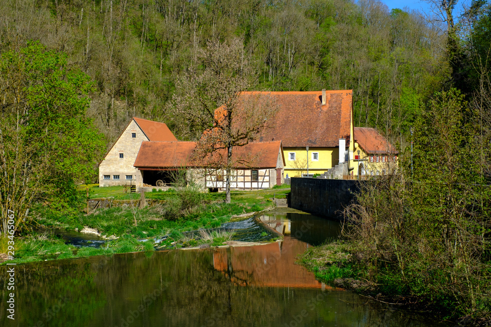 Tauber river and secluded houses in Tauber Valley, Rothenburg ob der Tauber, Bavaria, Germany Tauber river and secluded houses in Tauber Valley, Rothenburg ob der Tauber, Bavaria, Germany