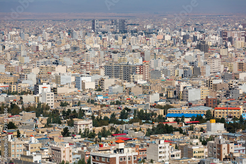 Panoramic view of the building density of Qom city, Iran. Dense urban development, unfinished houses, general view of the modern part of the city