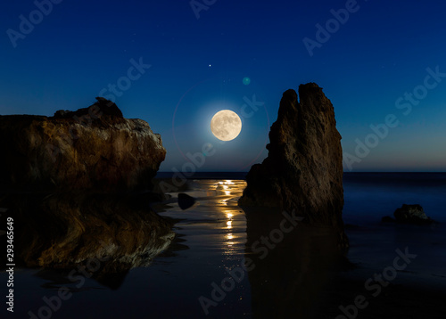 full moon rising over elmatador beach