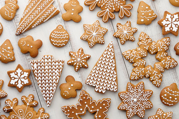Christmas gingerbread cookies set on white planks