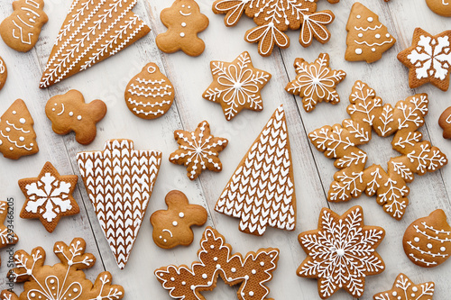 Christmas gingerbread cookies set on white planks