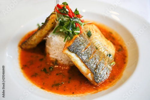 Photography An upmarket fish dish with a serving of rice and sauce