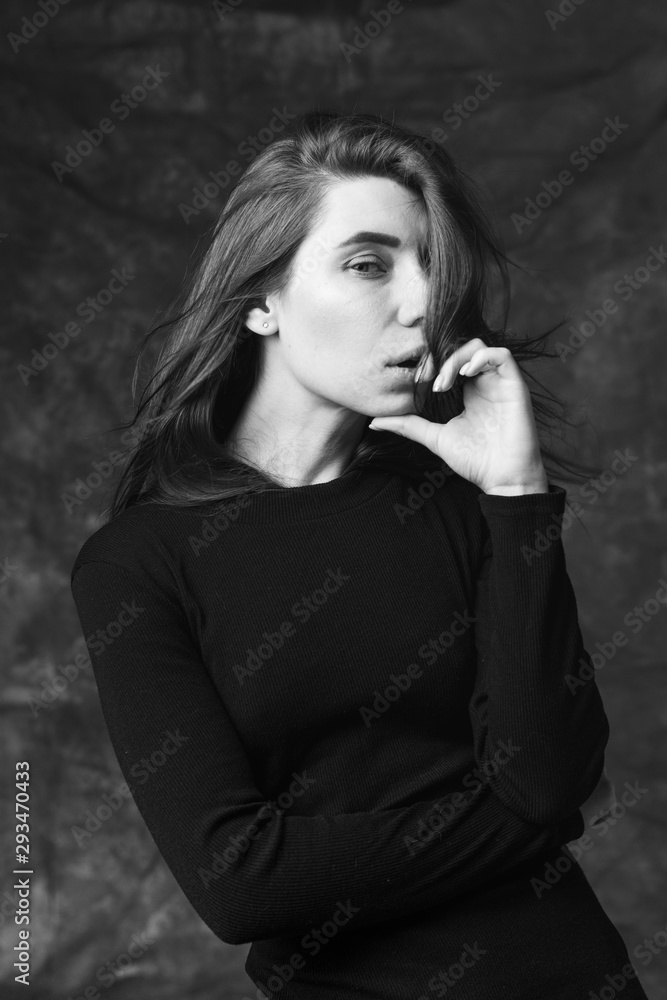 Beautiful feminine girl in a dress on a canvas background. Art portrait Beautiful feminine girl in a dress on a canvas background. Art portrait