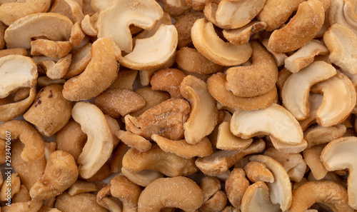 Roasted and salted cashews very close view.
