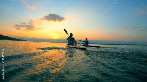 Canoeing race held at the sunset lake photo