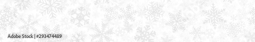 Christmas horizontal seamless banner of many layers of snowflakes of different shapes, sizes and transparency. Light gray on white © Aleksei Solovev