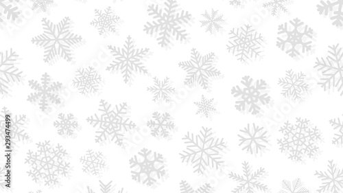 Christmas background of snowflakes of different shapes and sizes with shadows. Gray on white