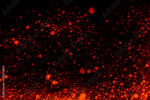 Beautiful abstract texture color black orange and lava red wall background on the darkness stone pattern colorful fire backgrounds
