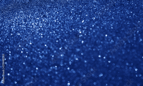 Blurred texture of sparkling glitter paper.