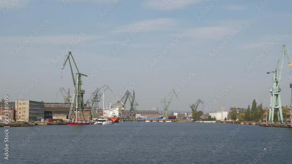 Sea Shipping Port with Cargo Cranes in Gdansk city at summer day Sea Shipping Port with Cargo Cranes in Gdansk city at summer day