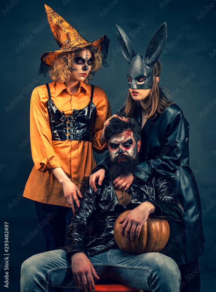 Halloween Party people. Fashion Glamour Halloween. Happy gothic group in Halloween  costume. Enjoying nice Halloween together. Stock Photo | Adobe Stock