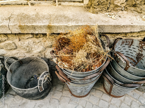 dried herb and flower straws in the basket photo