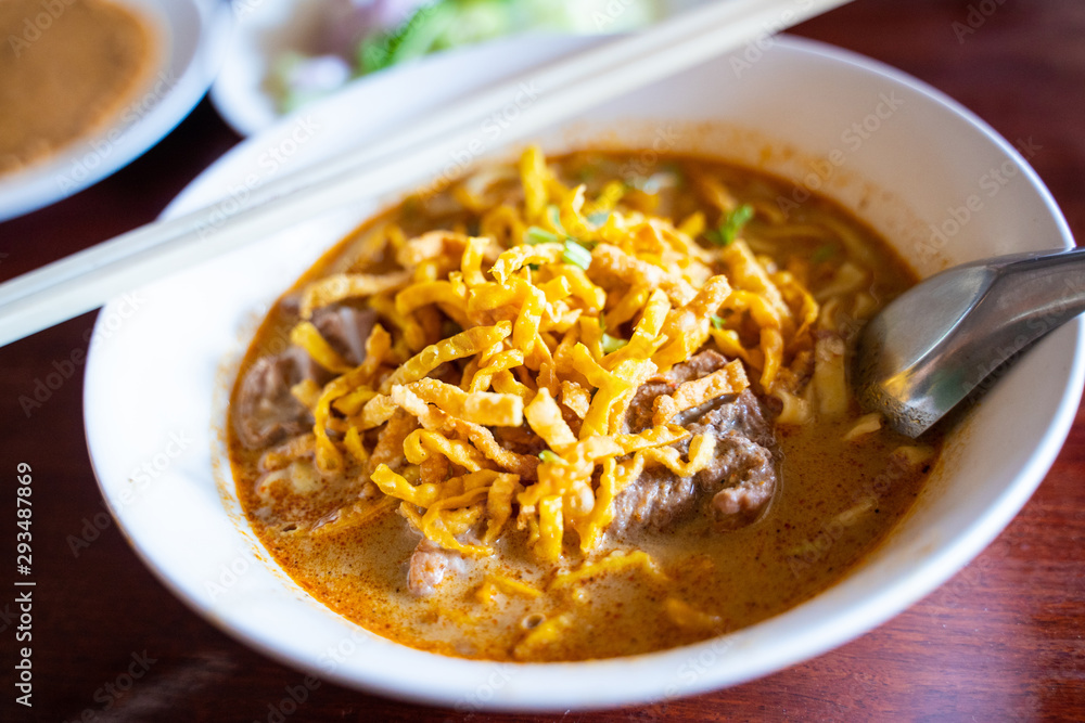 Khao Soi - thai curry noodles with pork Khao Soi - thai curry noodles with pork