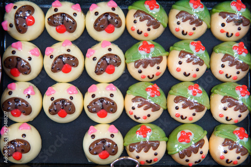 Chocolates in different shapes and sizes sold in open food market.