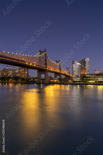 View on Queensboro Bridge and Roosevelt island architecture at night with long exposure © Andriy Stefanyshyn