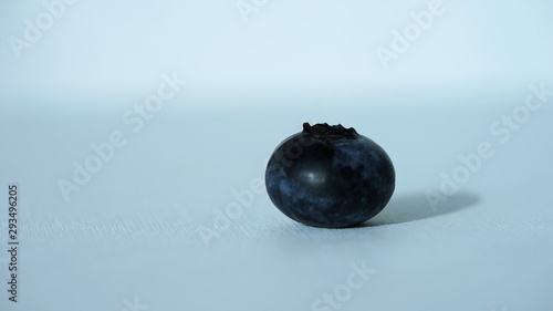 side view on blueberry on blurred background