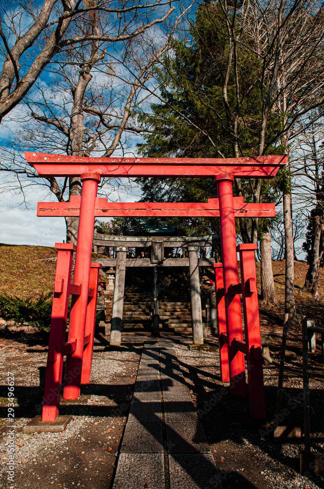 Aizu Wakamatsu Tsuruga Jo Castle Inari shrine red Torii. Fukushima - Japan Aizu Wakamatsu Tsuruga Jo Castle Inari shrine red Torii. Fukushima - Japan