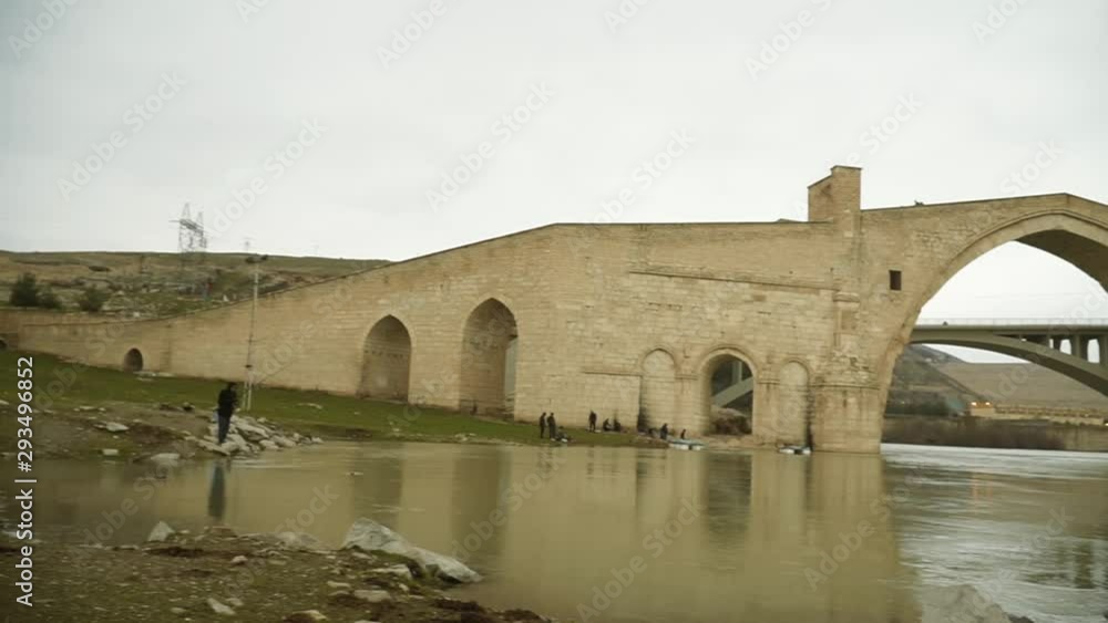 THE HISTORIC MALABADI BRIDGE IN DIYARBAKIR, TURKEY THE HISTORIC MALABADI BRIDGE IN DIYARBAKIR, TURKEY