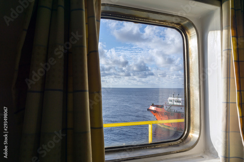 Foto view from cabin window of a construction barge