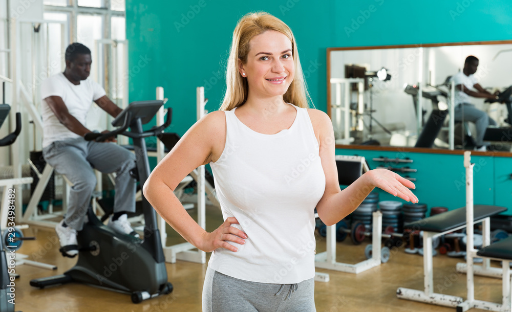 Fototapeta premium Girl in sportswear at gym