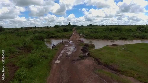 aerial footage of a flooded bridge photo