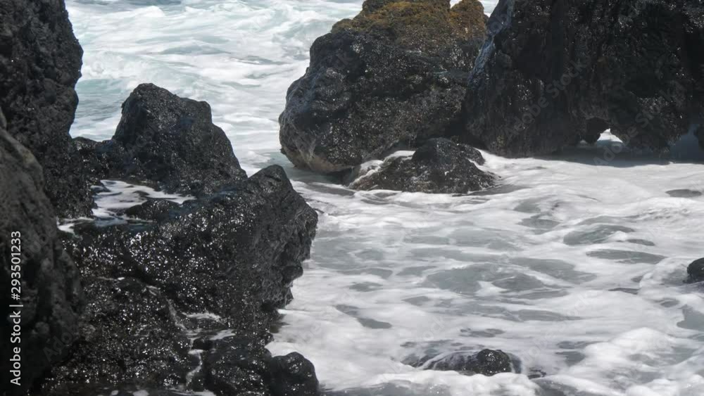 Close Up of Waves Crashing Into Lava Rock Tide Pool 60fps Close Up of Waves Crashing Into Lava Rock Tide Pool 60fps