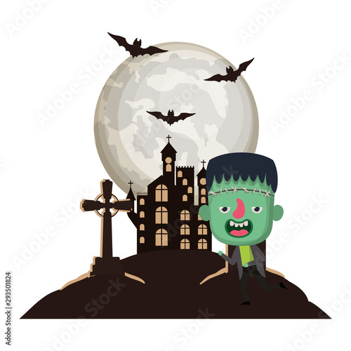 cute little boy with frankenstein costume in cemetery scene photo