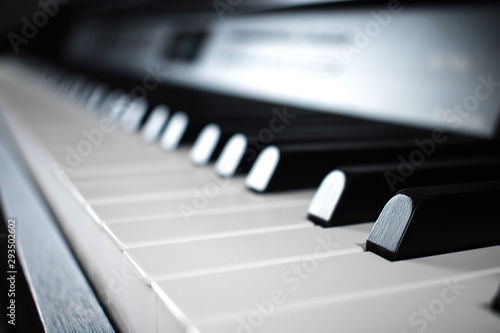 Close-up of piano and piano keyboard.
