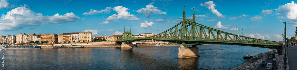 Fototapeta Panoramic view of Budapest traditional architecture buildings rising above Danube river