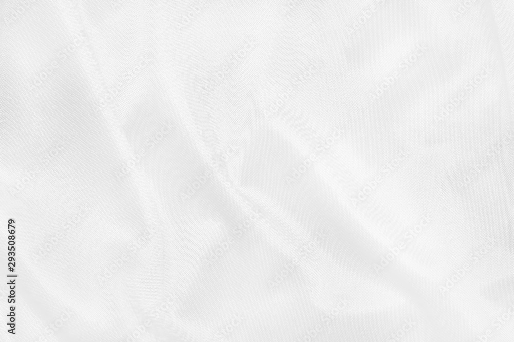 White fabric cloth texture for background and design art work, beautiful crumpled pattern of silk or linen.