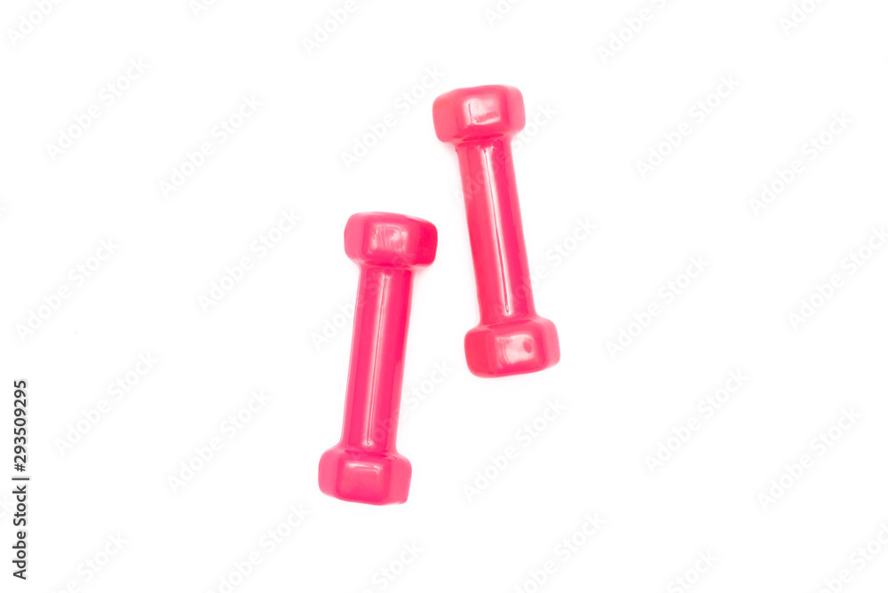Two pink dumbbells isolated on white background. Two pink dumbbells isolated on white background.