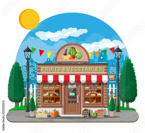 Street brick shop building exterior. Fruit and vegetable store. Fresh organic food products. Cucumber tomato pumpkin carrot corn pepper banana. Nature cityscape panorama. Flat vector illustration