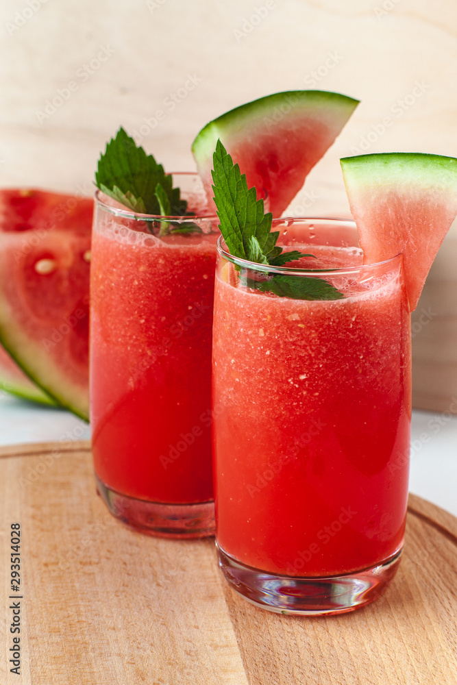 Vitamin watermelon smoothie for vegans on a yellow background. Super food for detox Vitamin watermelon smoothie for vegans on a yellow background. Super food for detox