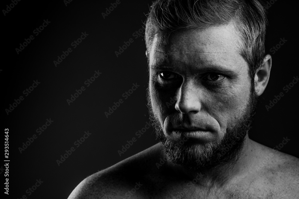 Portrait of a man with a beard on a black background Portrait of a man with a beard on a black background