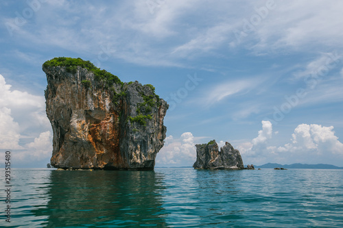Small limestone island in the ocean, Thailand.  © belyaaa